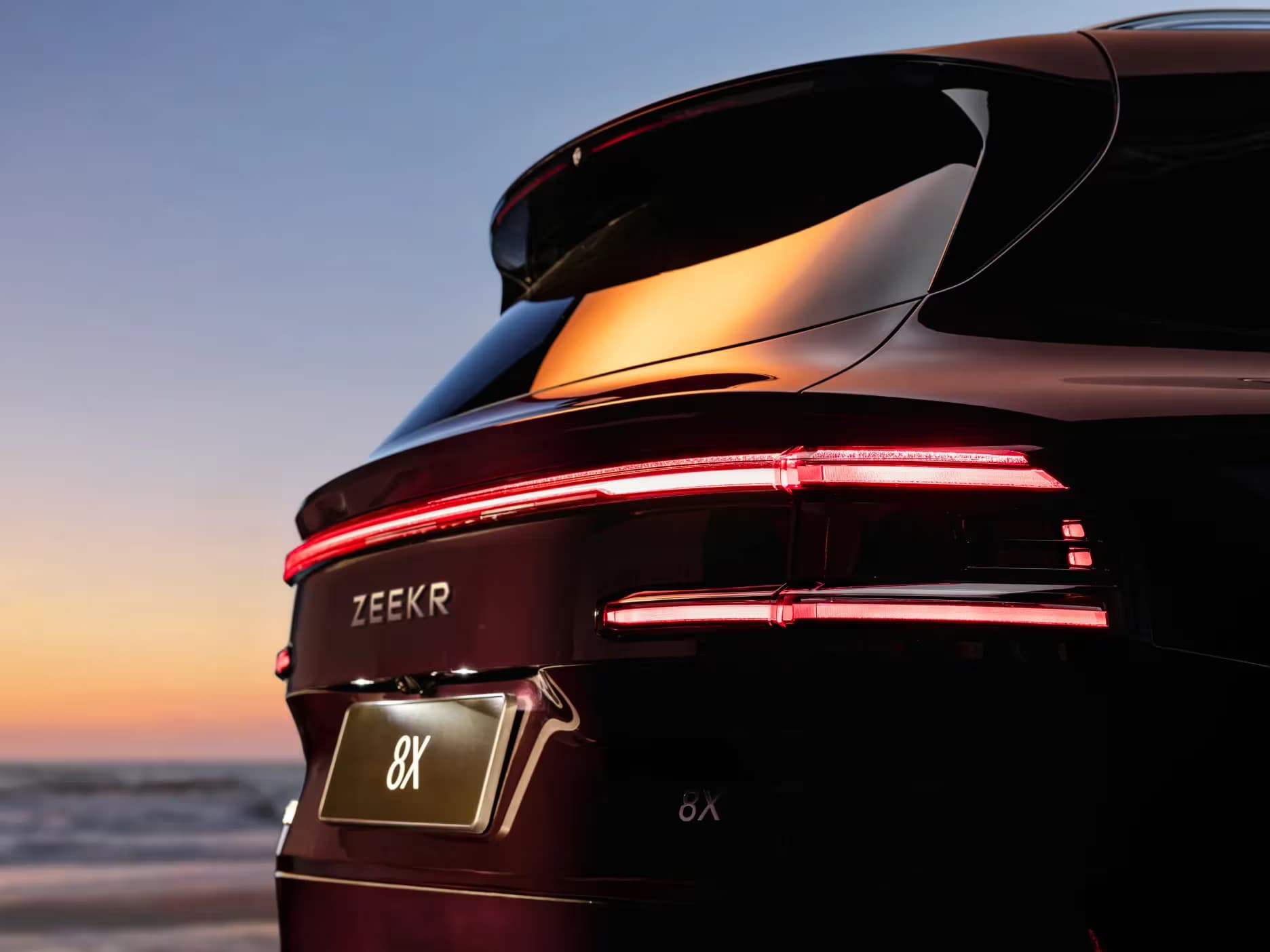 The coastline runs through the taillights
